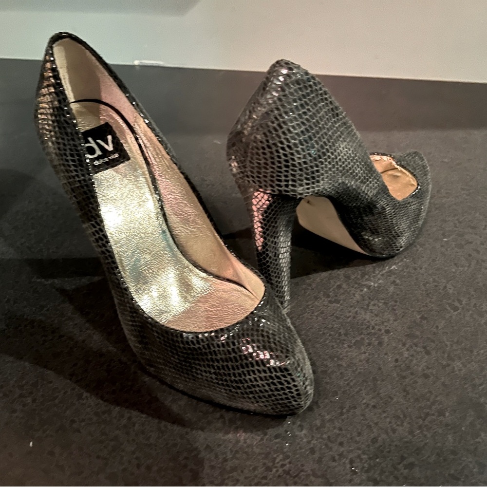 Blue black heels with glitter.